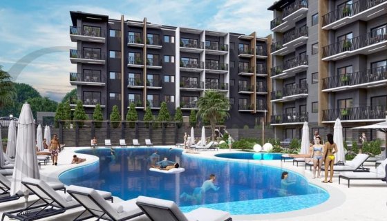 KUŞADASINDA SATILIK MERKEZI KONUM-7/24 GÜVENLİK-HAVUZ-BAHÇE-KOMBİ-LÜX-FIRSAT DAİRELER